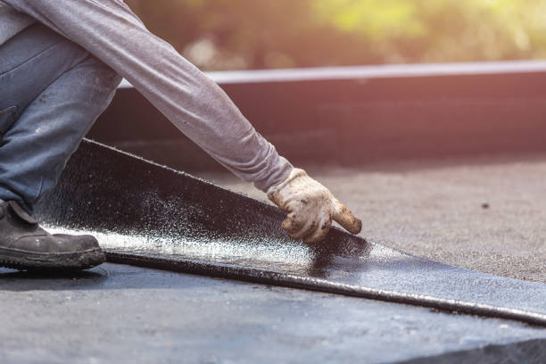 Professional Basement Waterproofing technician working in Lebanon, KY
